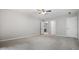 Large bedroom with multiple doors for easy access, carpeted floors and ceiling fan at 1010 Longcreek Pointe, Alpharetta, GA 30005