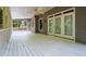 Spacious outdoor deck with ceiling fans, white railings, and double doors for indoor-outdoor living at 1010 Longcreek Pointe, Alpharetta, GA 30005