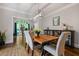 Well-lit dining room featuring hardwood floors and elegant decor at 1010 Longcreek Pointe, Alpharetta, GA 30005