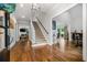 Spacious foyer with hardwood floors and staircase leading to the upper level at 1010 Longcreek Pointe, Alpharetta, GA 30005