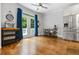 Bright, spacious breakfast nook featuring hardwood floors, natural light, and a stainless steel refrigerator at 1010 Longcreek Pointe, Alpharetta, GA 30005