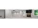 This living room offers a stone fireplace, tv, and multiple access points at 1010 Longcreek Pointe, Alpharetta, GA 30005