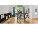 Bright home office featuring hardwood floors, built in shelving and a large window at 1010 Longcreek Pointe, Alpharetta, GA 30005
