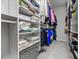 Organized walk-in closet with shelving, hanging rods, and ample storage space at 1010 Longcreek Pointe, Alpharetta, GA 30005