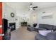 Inviting living room featuring a modern fireplace, vaulted ceilings, and a comfortable sectional sofa at 379 Villa Rosa Way, Temple, GA 30179