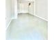 Finished basement with painted concrete flooring, white trim, and gray walls offers a versatile living space at 654 Continental Dr, Lawrenceville, GA 30044
