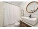 Modern bathroom with vanity and shower at 7114 Surrey Pt, Alpharetta, GA 30009