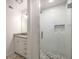 Bathroom features white subway tiled shower, modern vanity, and unique tiled floors at 7114 Surrey Pt, Alpharetta, GA 30009