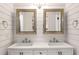 Bathroom with and sink, white vanity, and accent mirrors at 7114 Surrey Pt, Alpharetta, GA 30009