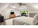Bedroom with sitting and desk area, carpet, and natural light at 7114 Surrey Pt, Alpharetta, GA 30009
