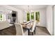 Dining room with view to living room and backyard at 7114 Surrey Pt, Alpharetta, GA 30009