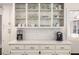 Well designed kitchen with shelving and coffee makers at 7114 Surrey Pt, Alpharetta, GA 30009