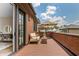 Inviting outdoor patio with comfortable seating, an umbrella, and a view of the surrounding neighborhood at 210 4Th St, Fayetteville, GA 30214
