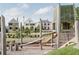 Community playground with modern play structures and lush green surroundings in a neighborhood setting at 210 4Th St, Fayetteville, GA 30214