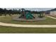 Community playground with a variety of slides, climbing structures, and play equipment at 5370 Tolar Rd, South Fulton, GA 30213