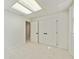 Finished basement area includes a closet, window, and neutral carpet at 5631 Queensborough Dr, Atlanta, GA 30338