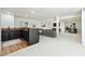 Finished basement with a bar area featuring dark cabinetry, light countertops, and carpeted floors at 5631 Queensborough Dr, Atlanta, GA 30338