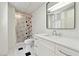 Modern bathroom features a walk-in shower and single sink vanity at 5631 Queensborough Dr, Atlanta, GA 30338
