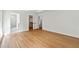 A bedroom features newly refinished hardwood floors, a walk-in closet and an ensuite bathroom at 5631 Queensborough Dr, Atlanta, GA 30338