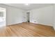 Spacious bedroom boasts gleaming hardwood floors and a large walk-in closet at 5631 Queensborough Dr, Atlanta, GA 30338