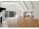 Spacious living room featuring hardwood floors and large windows at 5631 Queensborough Dr, Atlanta, GA 30338