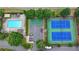 Aerial view of community amenities with swimming pool, tennis court and parking at 785 Cirrus Dr, Johns Creek, GA 30022