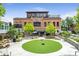 Entrance to Jekyll Brewing featuring an inviting patio, lush landscaping, and the Central City Tavern sign at 785 Cirrus Dr, Johns Creek, GA 30022