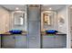 Elegant main bathroom featuring dual vanities, modern fixtures, and sleek design at 785 Cirrus Dr, Johns Creek, GA 30022