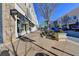 Charming retail street with shops like Allbirds, inviting storefronts, pedestrian walkways, and neatly lined parking at 785 Cirrus Dr, Johns Creek, GA 30022