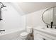 Cozy bathroom with a tub, modern fixtures, and tiled floors, creating a comfortable and efficient space at 956 Clifton Ne Rd, Atlanta, GA 30307