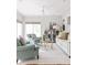 Airy living room filled with lots of natural light, comfortable seating, and a modern decor at 956 Clifton Ne Rd, Atlanta, GA 30307