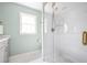Modern bathroom with glass shower and decorative tiles, combining style and functionality at 956 Clifton Ne Rd, Atlanta, GA 30307