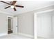 Bedroom featuring a closet and neutral carpeting at 1916 Highway 138 Sw, Conyers, GA 30094