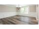 Bright dining room with hardwood floors, and decorative lighting at 1916 Highway 138 Sw, Conyers, GA 30094