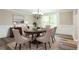 Elegant dining room featuring hardwood floors and stylish decor at 1916 Highway 138 Sw, Conyers, GA 30094