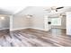 Spacious living room with wood floors, and lots of natural light at 1916 Highway 138 Sw, Conyers, GA 30094