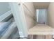 Carpeted stairs leading to lower or upper level at 1916 Highway 138 Sw, Conyers, GA 30094