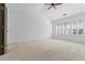 Bright bedroom with vaulted ceilings and large windows providing natural light at 3570 Bardfield Ct, Cumming, GA 30041