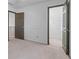 Spacious bedroom with neutral carpet and large closet for ample storage at 3570 Bardfield Ct, Cumming, GA 30041