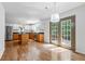Modern kitchen with stainless steel appliances, granite countertops, a center island, and natural light at 3570 Bardfield Ct, Cumming, GA 30041