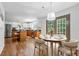 Eat-in kitchen featuring stainless appliances, central island, and views of the backyard at 3570 Bardfield Ct, Cumming, GA 30041