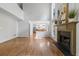 Spacious living room features high ceilings, hardwood floors, and a cozy fireplace at 3570 Bardfield Ct, Cumming, GA 30041