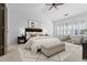 Spacious main bedroom with a large window, comfortable seating, and stylish decor at 3570 Bardfield Ct, Cumming, GA 30041