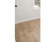 Spacious bedroom features light-wood flooring and a view from the window at 4410 Ross Estates Ct, Snellville, GA 30039