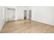 Bright bedroom with walk-in closet and light wood flooring at 4410 Ross Estates Ct, Snellville, GA 30039