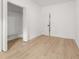 Bedroom featuring closet space and hardwood floors at 4410 Ross Estates Ct, Snellville, GA 30039
