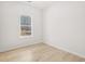 Bright room with wood floors and a window providing natural light at 4410 Ross Estates Ct, Snellville, GA 30039
