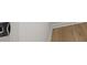 Wood-look vinyl flooring, white trim, and a door showcasing the unit's interior design details at 4410 Ross Estates Ct, Snellville, GA 30039