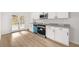Modern kitchen with stainless appliances and granite countertops at 4410 Ross Estates Ct, Snellville, GA 30039