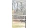 Window view of the property's wooded lot at 4410 Ross Estates Ct, Snellville, GA 30039